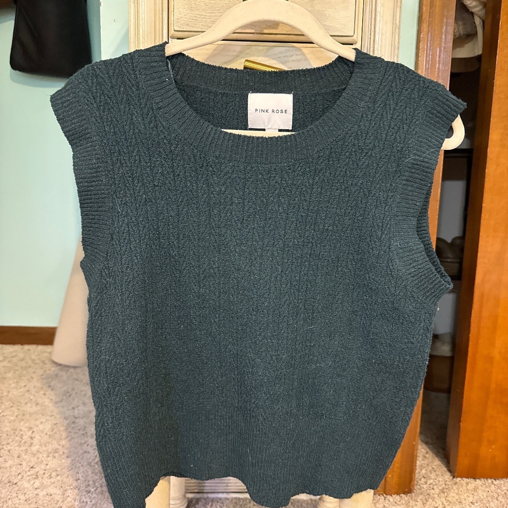 Green sweater vest